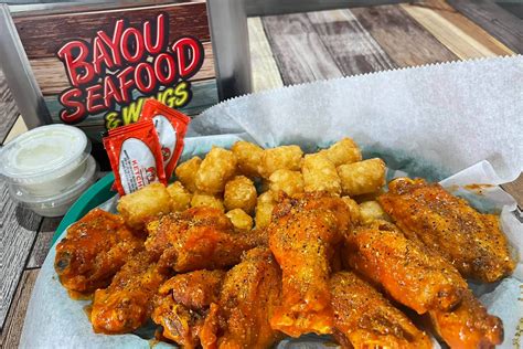 Bayou seafood and wings - “I've had the stuffed shrimp, chicken and sausage jambalaya, crawfish ettouffee, crawfish stuffed shrimp with twice baked potatoes, and the seafood chowder. ” in 2 reviews